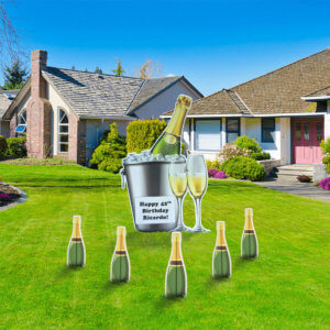 CHAMPAGNE BOTTLE IN ICE BUCKET WITH 2 GLASSES LAWN SIGN SET UP